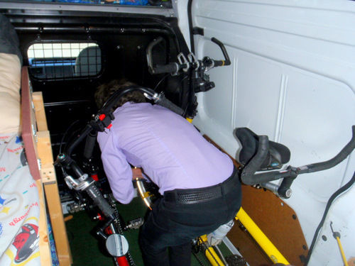 Ray is inside his van and is double checking the tie downs.